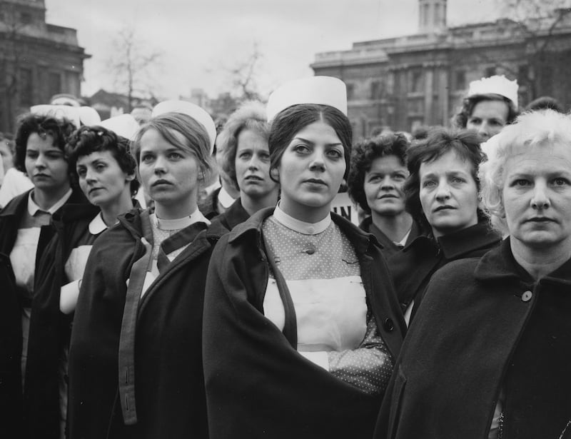 Some of the 8,000 nurses attending a protest meeting at Trafalgar Square, London, in support of their pay claim in 1952. Getty Images