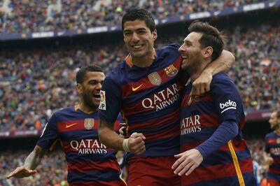 Luis Suarez, centre, formed a prolific partnership with Lionel Messi during their six years together at Barcelona. Reuters