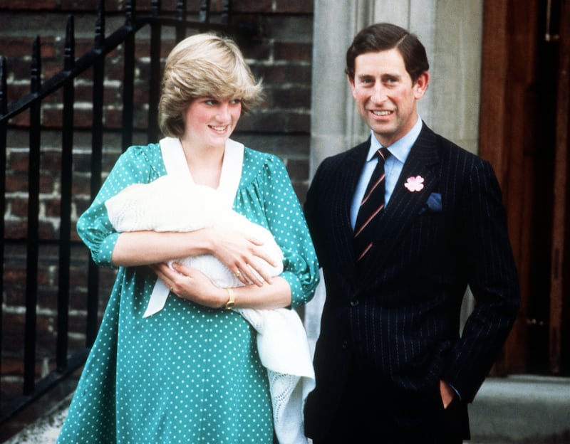 Prince Charles and Princess Diana on the steps of the Lindo Wing at St. Mary's Hospital with their son, Prince William, as they left for Kensington Palace, June 1982