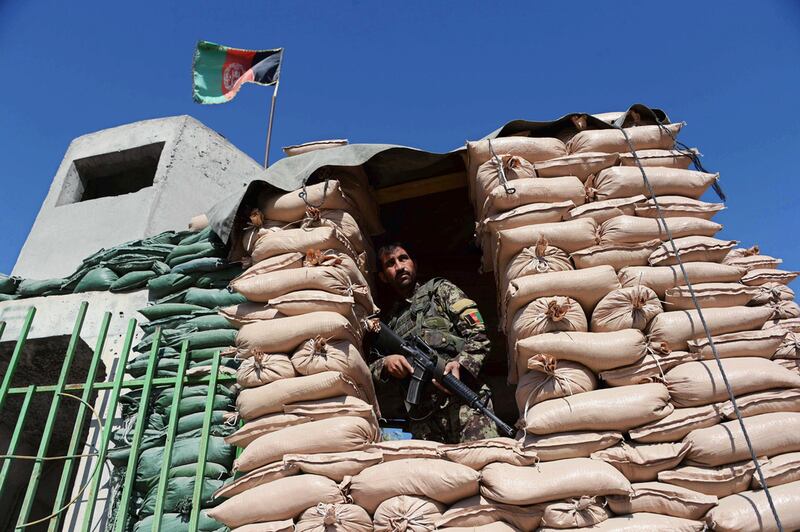 A soldier guards Jalalabad airport after the Taliban claimed to have shot down a US military transport plane that crashed in the area in October 2015. While Taliban and ISIL fight for control of areas around Jalalabad, the city itself is in thrall to powerful political clans. Noorullah Shirzada / AFP / October 2, 2015