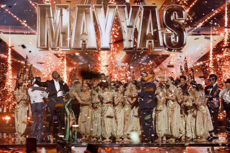 Host Terry Crews, far left, with members of the female Lebanese dance troupe Mayyas, who were crowned winners of the latest season of 'America's Got Talent'. AP