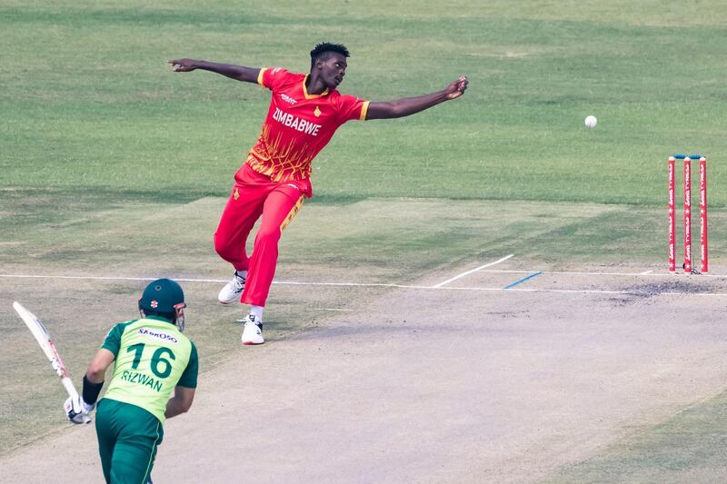 Zimbabwe's Richard Ngarava fields off his own bowling during the third Twenty20. AFP