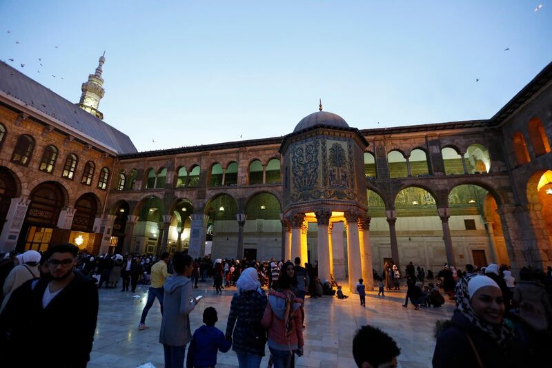 People attend the Mawlid, the birthday of Prophet Mohammad, celebrations at the courtyard of the Umayyad Mosque in the Old City in Damascus, Syria.  EPA