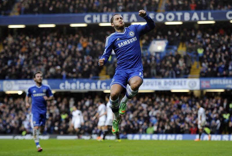 Eden Hazard celebrates after scoring for Chelsea against Swansea during an English Premier League match at Stamford Bridge on Thursday. Andy Rain / EPA