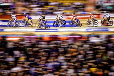 TOPSHOT - Track riders compete during the Zesdaagse Vlaanderen-Gent six-day indoor cycling race at the 't Kuipke ' cycling arena, on November 17, 2019 in Gent. - Belgium OUT / AFP / BELGA / YORICK JANSENS