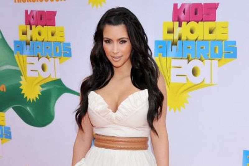 Kim Kardashian arrives at Nickelodeon's 24th Annual Kids' Choice Awards on Saturday, April 2, 2011, in Los Angeles. (AP Photo/Vince Bucci) *** Local Caption ***  CADB149_2011_Kids_Choice_Awards_Arrivals.jpg