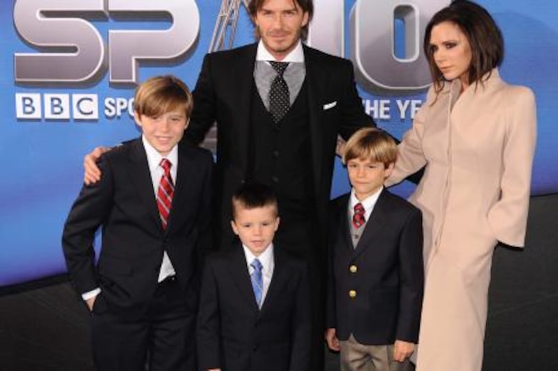 epa02818572 (FILE) A file photograph showing David Beckham (C) with wife Victoria (R) and their children Brooklyn, Romeo and Cruz arriving at the National Exhibition Center Birmingham for the BBC Sports Personality of the Year award gala in Birmingham, central England, on 19 December 2010.  A spokesman for David Beckham said on 10 July 2011 the soccer star's wife Victoria has given birth to a healthy baby girl, who was delivered on the morning of 10 July 2011 at Cedars Sinai hospital in Los Angeles, California, USA, and weighed in at 7lbs, 10oz (3.46kg).  EPA/NICK WILKINSON UK AND IRELAND OUT *** Local Caption *** 00000402501948 02818572.jpg