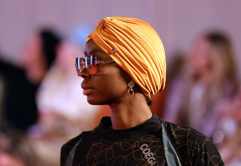 A bright orange headscarf from Al Haya Paris.