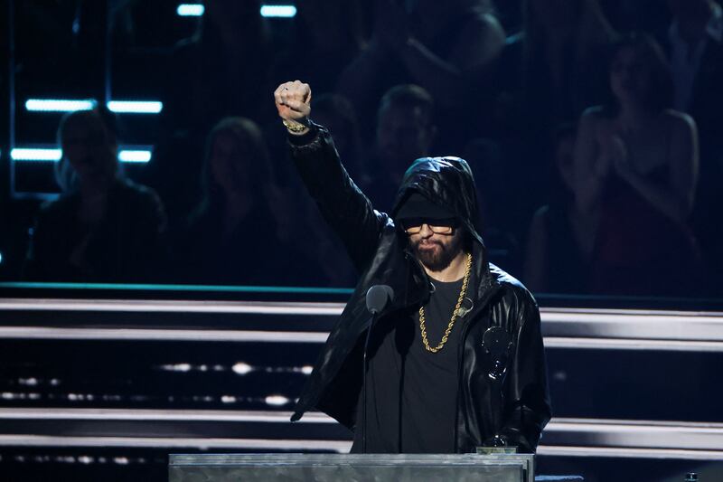 Eminem gestures while on stage. Reuters