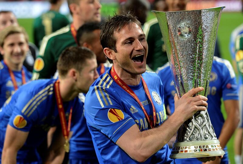 FILE PHOTO: Chelsea player Frank Lampard holds the trophy after defeating Benfica in the Europa League final soccer match at the Amsterdam Arena May 15, 2013.      REUTERS/Paul Vreeker/File Photo