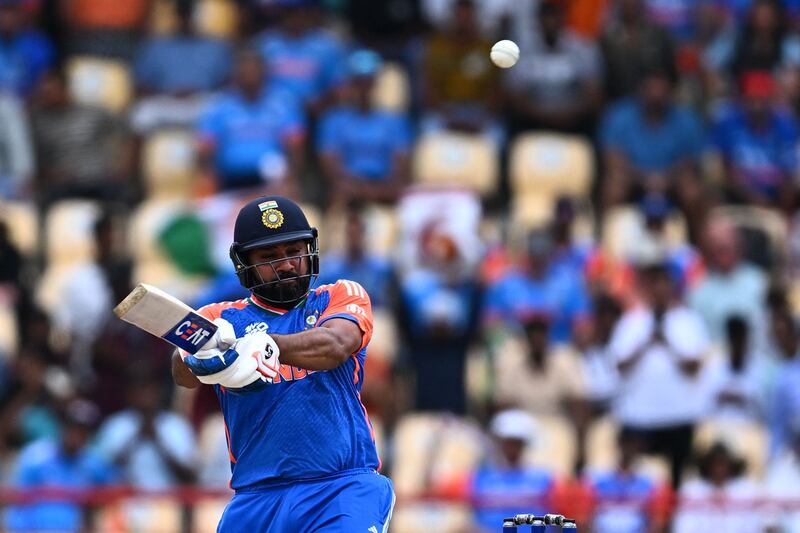 India's captain Rohit Sharma hits a six. AFP