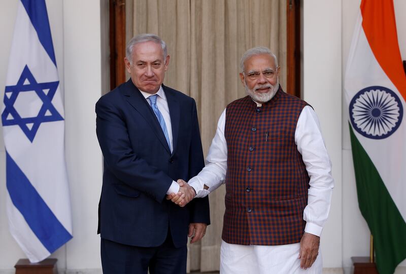 FILE PHOTO: Israeli Prime Minister Benjamin Netanyahu shakes hands with his Indian counterpart Narendra Modi during a photo opportunity ahead of their meeting at Hyderabad House in New Delhi, India, January 15, 2018.  (REUTERS)
