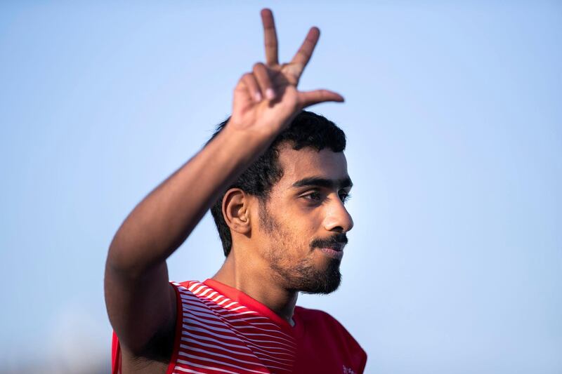 DUBAI, UNITED ARAB EMIRATES - March 19 2019.KHAMEIS ALDHANHANI wins 7th place Special Olympics World Games athletics 100M race in Dubai Police Academy Stadium. (Photo by Reem Mohammed/The National)Reporter: Section:  NA