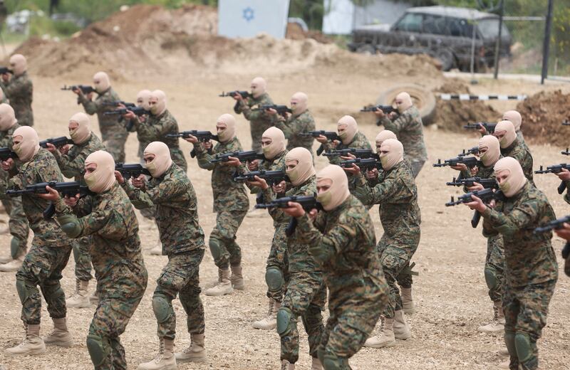 Hezbollah members take part in a military exercise in Aaramta, Lebanon. Reuters