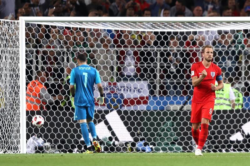 The Penalty shoot out begins - England's Harry Kane scores to make it 1-1.  Ryan Pierse / Getty Images