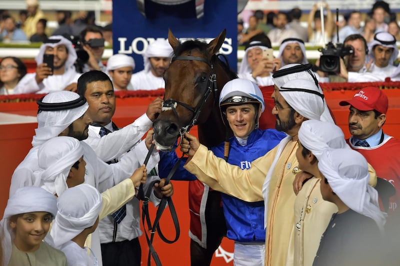 Sheikh Mohammed bin Rashid Al Maktoum, Vice-President and Prime Minister of the UAE and Ruler of Dubai, Sheikh Hamdan bin Mohammed bin Rashid Al Maktoum, Crown Prince of Dubai, and jockey Christophe Soumillon with Thunder Snow after winning the Dubai World Cup. Giuseppe Cacace / AFP