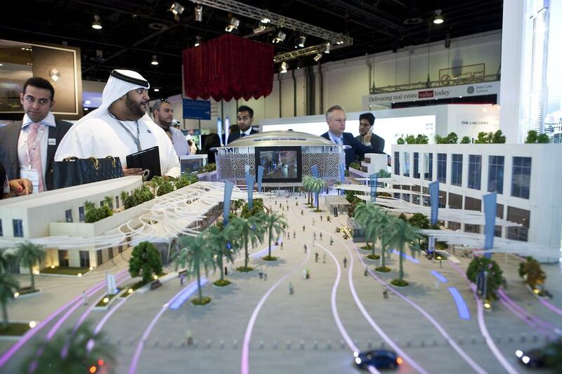 A model of the Opera District, an Emaar project, is displayed at Cityscape 2013 in Dubai. Razan Alzayani / The National 