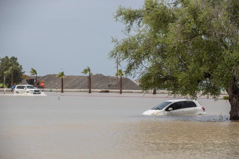 Vehicles submerged in water-logged roads in Fujairah.
Antonie Robertson / The National
