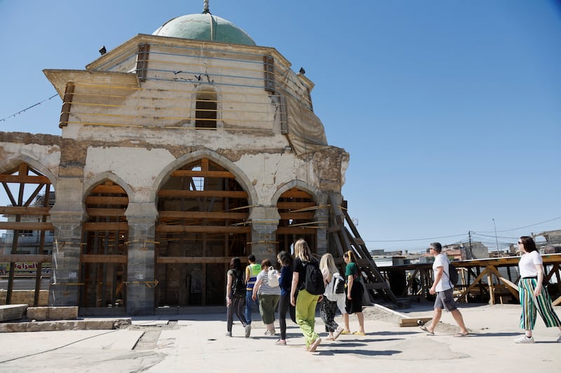 Tourists visit Al Nuri in April 2022. Reuters