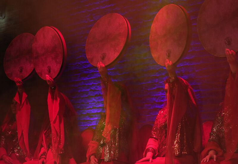 Sarmast musical group performers play the daf, a popular drumming instrument in Iran and Pakistan.