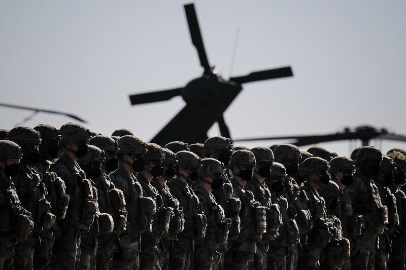 US soldiers on parade during the visit of Nato Secretary General Jens Stoltenberg to the Mihail Kogalniceanu airbase, near Constanta, eastern Romania. AP