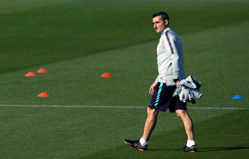 Barcelona manager Ernesto Valverde leads the training session. EPA