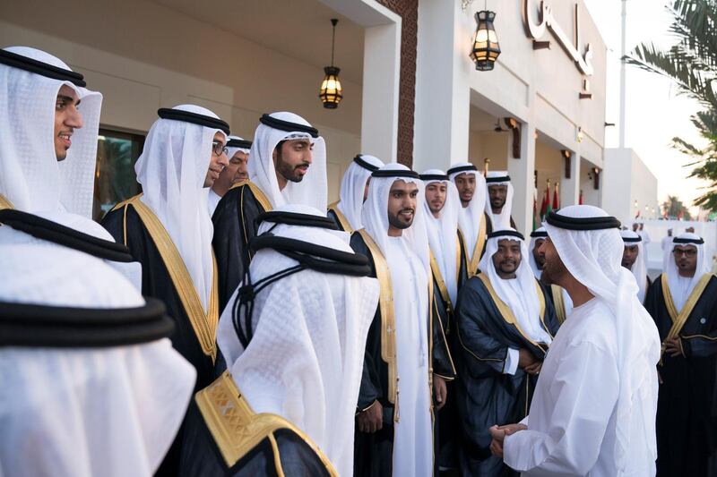 ABU DHABI, UNITED ARAB EMIRATES - November 15, 2018: HH Sheikh Mohamed bin Zayed Al Nahyan, Crown Prince of Abu Dhabi and Deputy Supreme Commander of the UAE Armed Forces (R), speaks with grooms during a mass wedding held at Majlis Al Manhal. 

( Hamad Al Kaabi  / Ministry of Presidential Affairs )
---