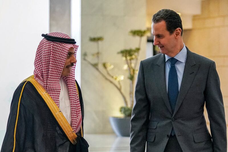 Syria's President Bashar Al Assad, right, receives Saudi Arabia's Foreign Minister Prince Faisal bin Farhan in Damascus on April 18. AFP
