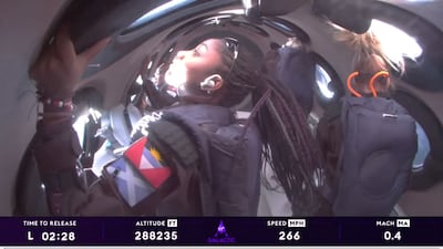 Anastatia Mayers, a student passenger on a Virgin Galactic flight, takes in the views of Earth. Virgin Galactic