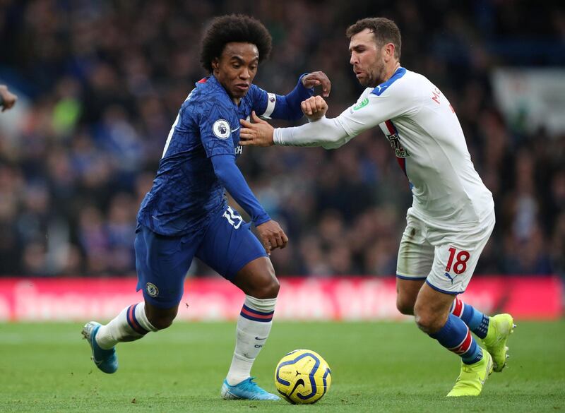 Chelsea's Willian battles with Crystal Palace's James McArthur. Reuters