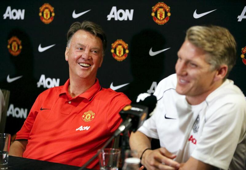 Louis van Gaal, left, will be pleased with the way Bastian Schweinsteiger has settled into the Manchester United squad. Jason Redmond / Reuters