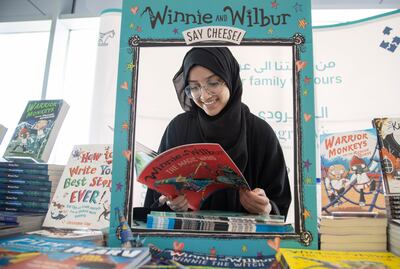 A visitor at the Emirates Airline Festival of Literature. Leslie Pableo / The National