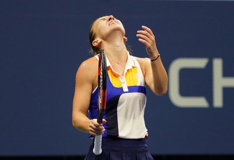 Simona Halep shows her frustration after losing a point. Don Emmert / AFP