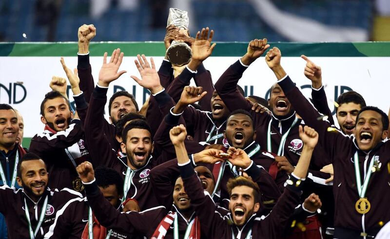 Qatar celebrate their Gulf Cup victory after beating Saudi Arabia 2-1 in the final at Riyadh in November. Fayes Nureldine / AFP