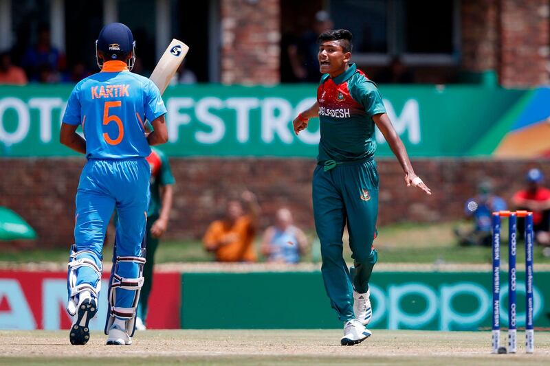 Bangladesh's Avishek Das, right, celebrates after the dismissal of  India's Kartik Tyagi in Potchefstroom. AFP