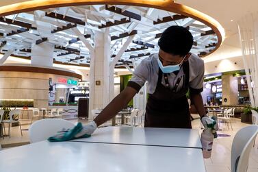 Housekeeping staff of the food court at Yas Mall in Abu Dhabi. Victor Besa / The National 