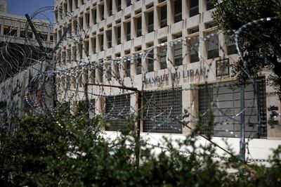 (FILES) This file photo taken on May 20, 2020 shows a view of the fortified entrance of the Banque du Liban, Lebanon's central bank, in the capital Beirut. Lebanon will have three more months to deliver key data for a forensic audit of the central bank after having failed to meet a November 3 deadline, the finance minister said today. / AFP / PATRICK BAZ
