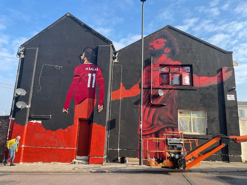 A mural of Liverpool star Mohamed Salah by local artist John Culshaw at Anfield Road, Liverpool. PA