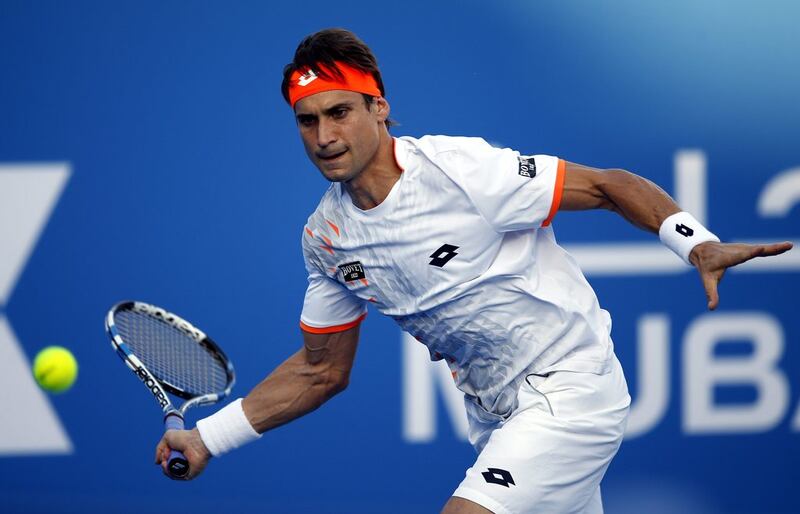 David Ferrer is through to the Mubadala World Tennis Champinship semi-finals after his 6-1 6-1 win over Jo-Wilfried Tsonga. Ali Haider / EPA