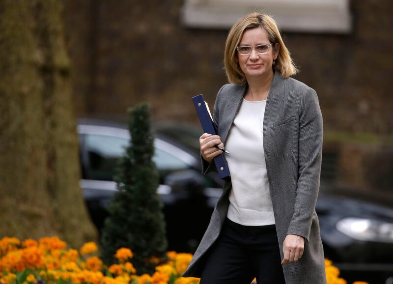FILE- In this Wednesday, March 29, 2017 file photo, Britain's Home Secretary Amber Rudd, arrives for a cabinet meeting in 10 Downing Street, London. Rudd  is traveling to California to press Internet firms to stem the flow of extremist content online, Tuesday, Aug. 1, 2017. (AP Photo/Alastair Grant, File)
