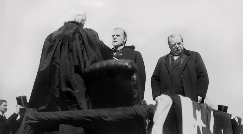 Chief Justice Melville Weston Fuller Administering Oath of Office to President William McKinley, Former President Grover Cleveland on Right, U.S. Capitol, Washington DC, USA, March 4, 1897. (Photo by: Glasshouse Vintage/Universal History Archive/Universal Images Group via Getty Images)
