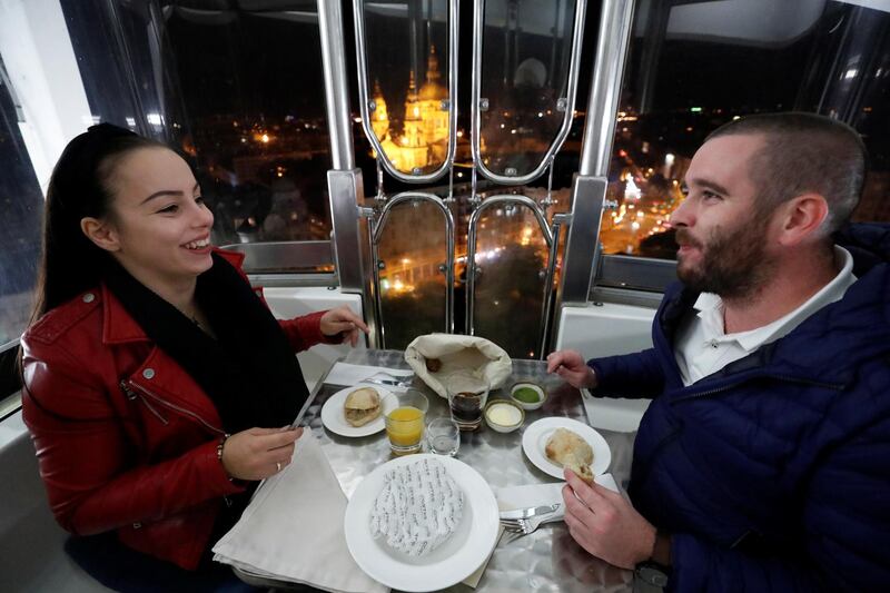 Hajnalka Lutor and Janos Katus enjoy their food as Michelin-starred restaurant Costes moves into the Budapest Eye. Reuters