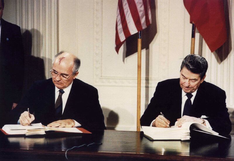 Reagan and Gorbachev sign the Intermediate-Range Nuclear Forces (INF) treaty at the White House in Washington on December 8, 1987. Reuters