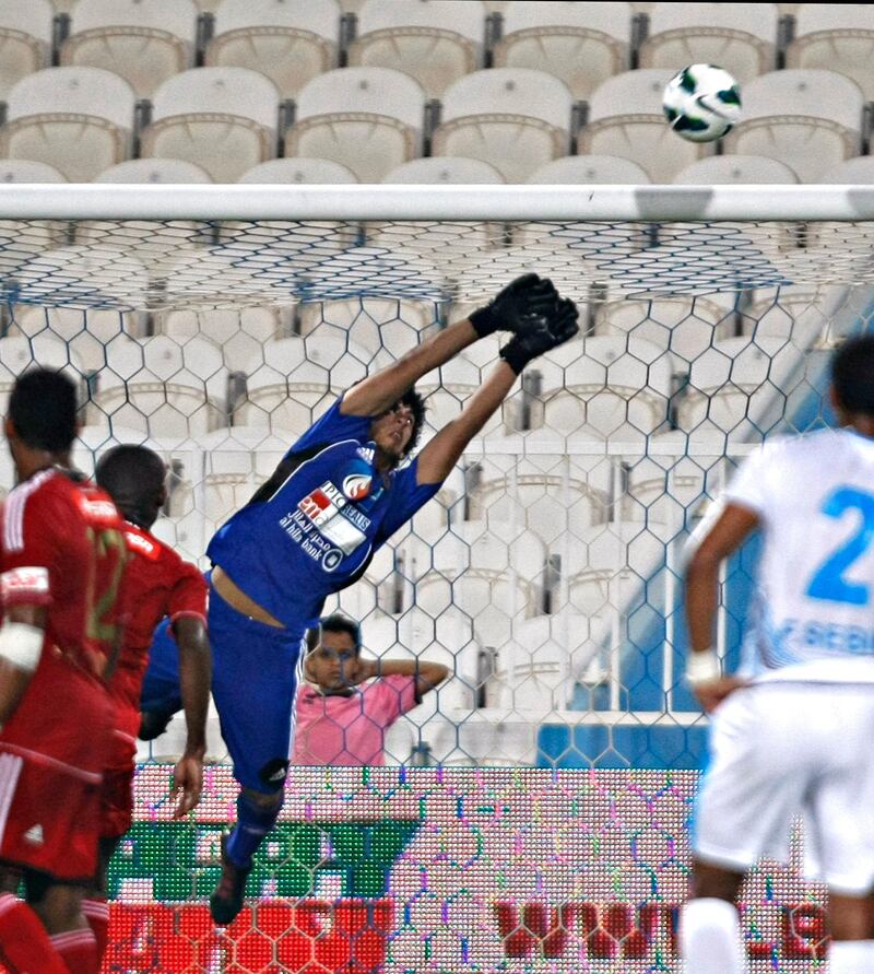 DUBAI, UNITED ARAB EMIRATES - October 9, 2012- Al Jazira's goalie Ahmed Ali Murbarak blocks a shot on goal against Baniyas that would have tied the score during second half football action in Baniyas Stadium in Baniyas, Abu Dhabi October, 9, 2012. Al Jazira defeated Baniyas 3-2. (Photo by Jeff Topping/The National)