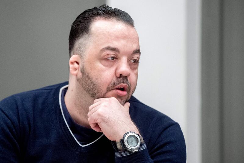 Former nurse Niels Hoegel, accused of killing more than 100 patients in his care, waits at court for his verdict at court in Oldenburg, northern Germany, on June 6, 2019. Hoegel was handed a life sentence for killing 85 patients in his care. The man accused of being post-war Germany's most prolific serial killer was known to colleagues as a "nice guy" who did little to arouse suspicion until well into his murder spree. / AFP / POOL / Hauke-Christian Dittrich
