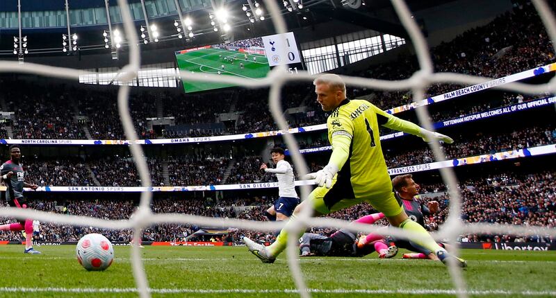 Tottenham's Son Heung-min scores their second goal past Leicester goalkeeper Kasper Schmeichel. Reuters