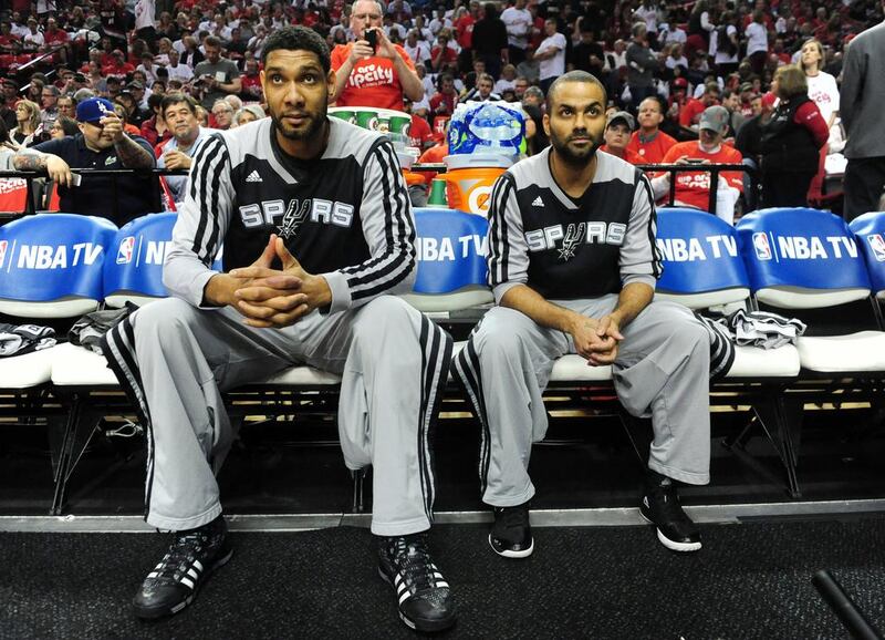 So interchangeable are the parts San Antonio has that neither Tim Duncan, left, or Tony Parker, right, need be the Spurs' primary scoring threat in a game. Steve Dykes / AFP