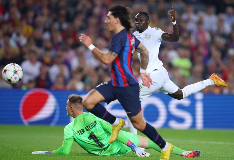 Bayern Munich's Sadio Mane scores his team's first goal past Marc-Andre ter Stegen of Barcelona. Getty