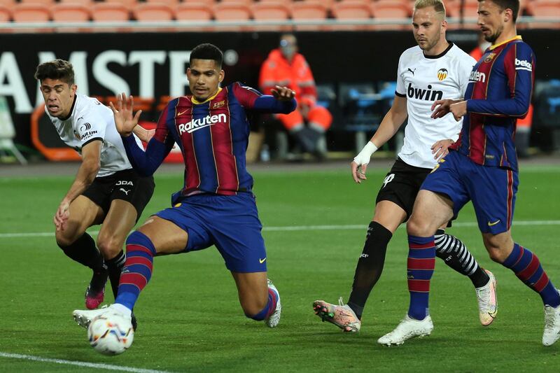 Sergino Dest 6 - The American wing-back was quieter than usual amid a tough battle against Jose Gaya. The Valencia defender often found space down Dest’s flank in the first half and made it difficult for the Barca man to get into dangerous areas. AP