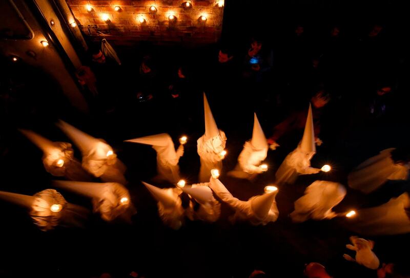 Penitents take part in a Holy Week procession in Verges, northeastern Spain. Pau Barrena / AFP Photo